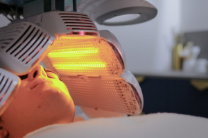 Woman being treated with LED light therapy